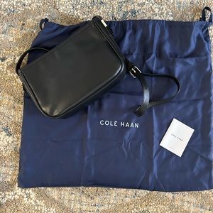 Cole Haan black leather crossbody bag. Includes dust bag. Excellent condition.